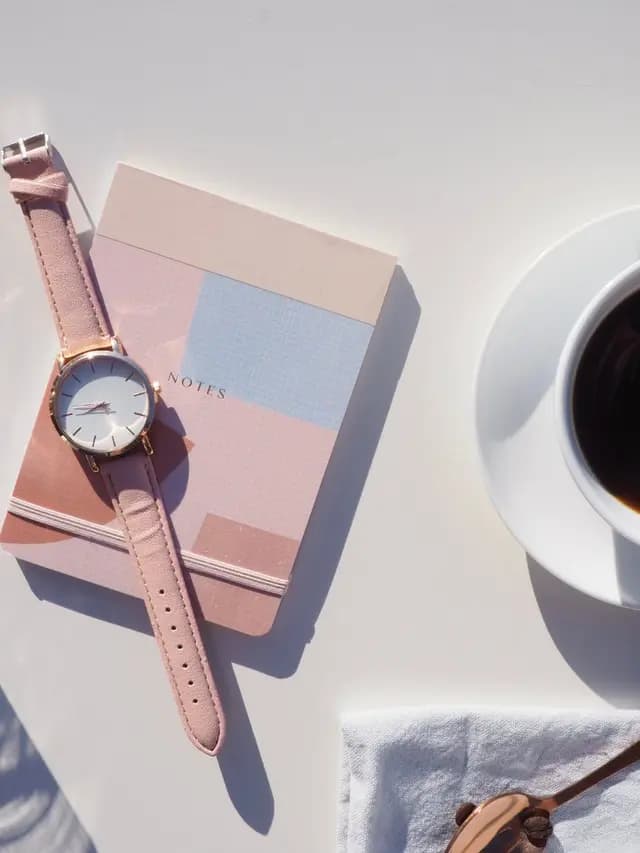 Pink watch flatlay
